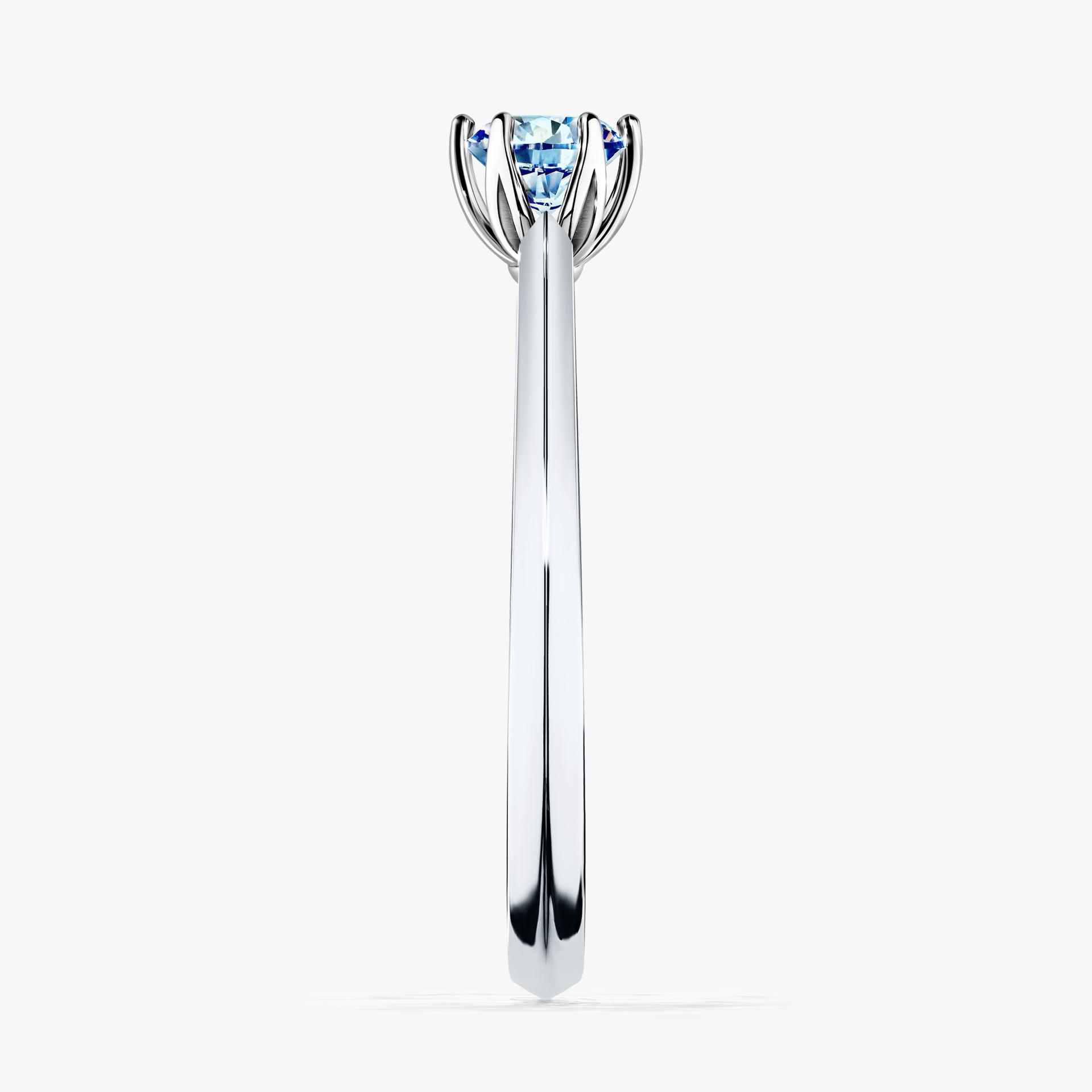 Pierscionek zareczynowy z diamentem niebieski 030 CT z bialego zlota my daisy 03
